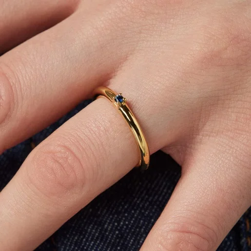 gold plated ring with small sapphire