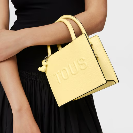 Model with Light yellow Cube Minibag TOUS Brenda