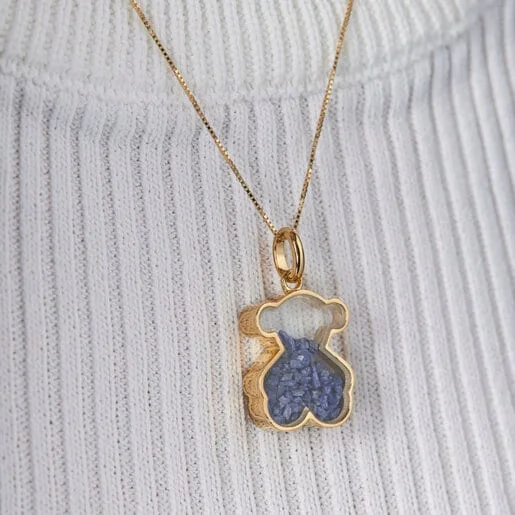 Gold and blue sapphire pendant