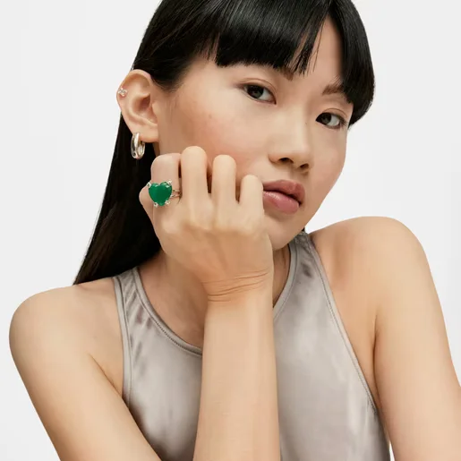 Model with Silver Color Pills Heart ring with treated chalcedony